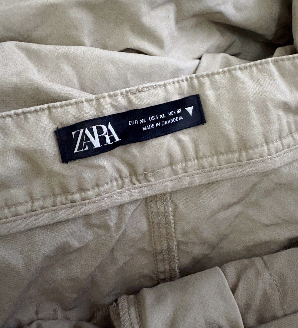 Zara Maxi Skirt Khaki (Category: Skirts) located in Manila. Submitted by topsh0ppe (Listing ID 1469236504, Image 3). Description: - Brand/Model: Zara Maxi Skirt - Color: Khaki Beige - Size: XL - Waist: Mid-rise with button closure - Details: Front pockets and panel seam detailing with textured fabric Waist up to 38in (high waist) Hips up to 45in Length 41in.