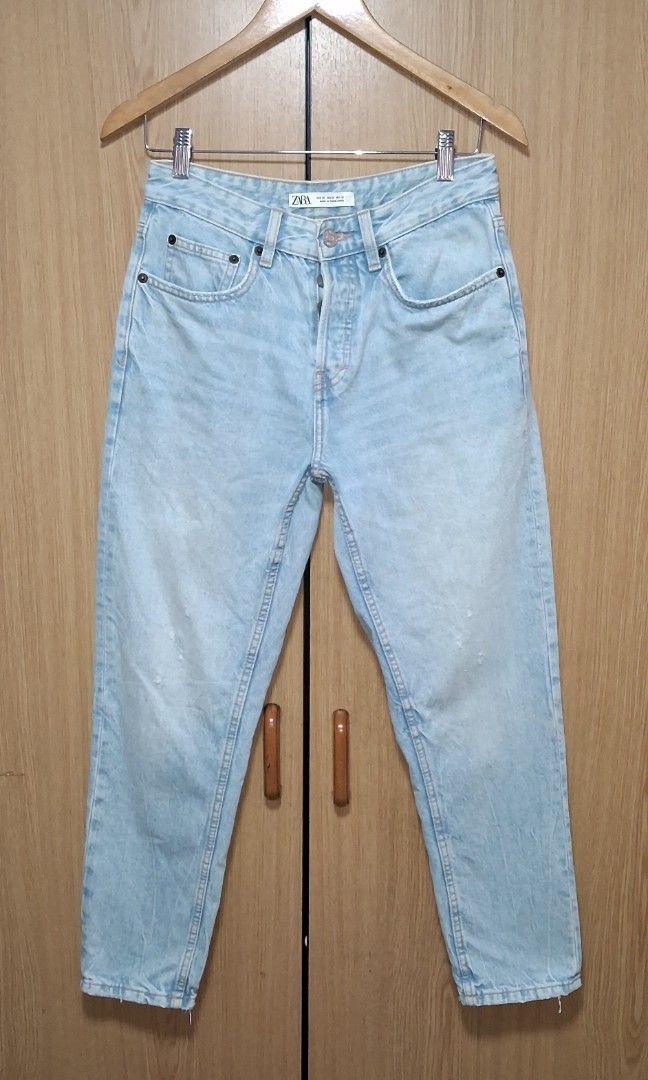 Zara Mom Button fly Jeans (Category: Jeans) located in Cebu City. Submitted by cebuanamomshies (Listing ID 1469324269, Image 2). Description: W28-29 Rise 11 inseam 26 Button fly High-rise light wash denim relaxed fit.