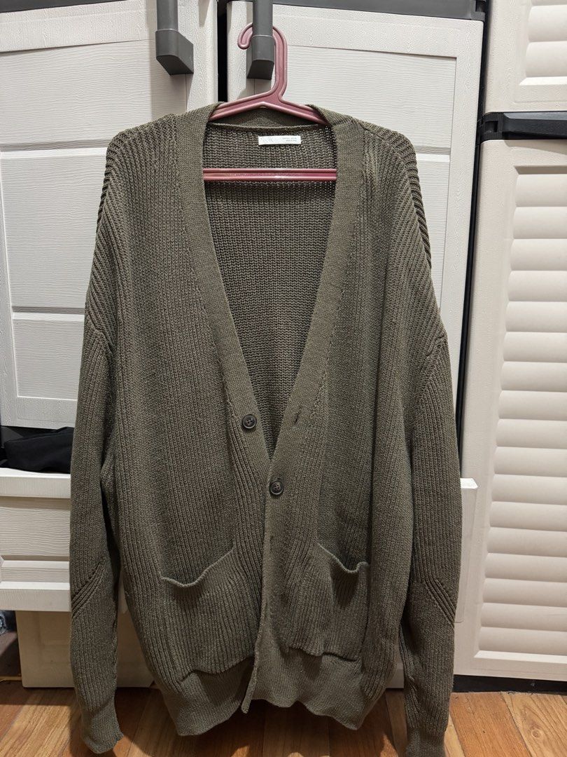 Zara Olive Green Knitted Cardigan (Category: Coats, Jackets and Outerwear) located in Pasig City. Submitted by calebmarvs (Listing ID 1469255375, Image 1). Description: - Brand/Model: Zara Knit Cardigan - Color: Olive Green - Size: Large (Oversized fit, Width: 25 inches, Length: 30-31 inches) - Details: Button-front closure with two front patch pockets - Condition: Clean and never been used 9.5/10 Shipping: Grab or Lalamove Location: Pasig City.