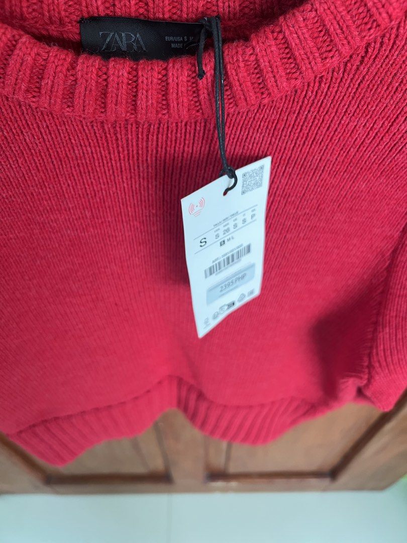 Zara Red Knit Sweater Size S (Category: Longsleeves) located in San Fernando. Submitted by prettyfinds2021 (Listing ID 1469303293, Image 2). Description: - Brand: Zara - Item: Red knit sweater - Size: S - Condition: Brand new with original store tag attached - Design details: Crew neckline, short puff sleeves, ribbed cuffs and hem.