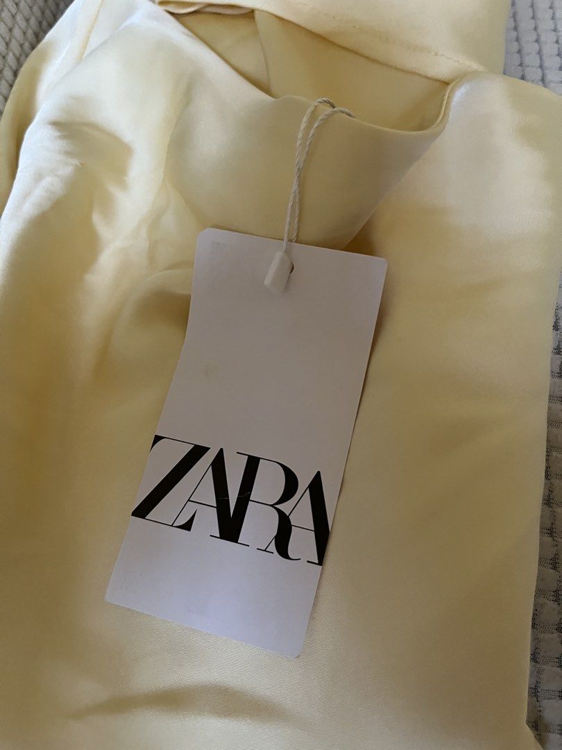 Zara Satin Yellow Top (Category: Sleeveless) located in Las Pinas. Submitted by moonryse (Listing ID 1469188472, Image 2). Description: I do not have “when worn” photos so please do not ask. I can however send more photos of the product mop: gcash, gotyme, bank transfer..