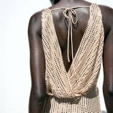 Zara Sequined V-Neck Dress (Category: Dresses) located in Cainta. Submitted by qualityyetaffordable (Listing ID 1469174425, Image 3). Description: - Brand: Zara - Style: Sequined midi dress - Color: Champagne gold - Size: XS to small - Condition: Brand new with tags (BNWT) - Details: Deep V-neck wrap front, ruched draping, side slit, and low drape back with adjustable tie strings.