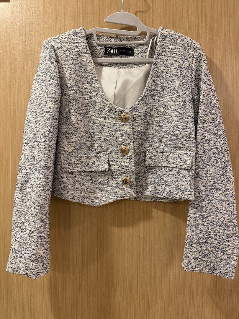 Zara Textured Crop Jacket Blue White Size S (Category: Coats, Jackets and Outerwear) located in Makati City. Submitted by lovedbyalexis_ (Listing ID 1469304016, Image 3). Description: - Brand: Zara - Style: Crop jacket in white and blue textured tweed - Details: Deep v-neckline, gold-tone metallic buttons, structured shoulders, faux pocket flaps - Interior: Fully lined - Size: EUR S / USA S / MEX 26 - Origin: Made in Turkey.