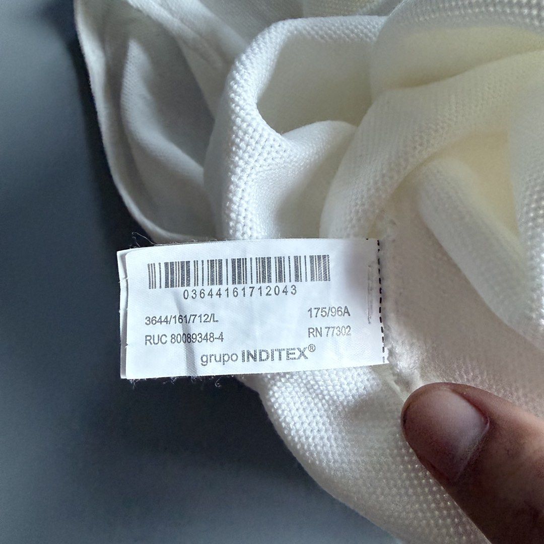 Zara White Knit Tank Top Size L (Category: Sleeveless) located in Benito Soliven. Submitted by markedasdifferent (Listing ID 1469252562, Image 3). Description: - Brand: Zara (Inditex Group) - Color: White - Size: L (fits standard) - Style: Knitted tank top, round neckline, sleeveless - Origin: Made in Turkey -19/28.5 - Condition: Clean, excellent pre-loved condition - Perfect everyday basic piece.