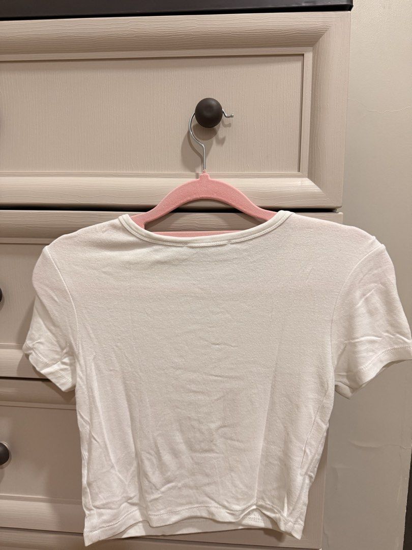 Zara White Ribbed Crop Top Size M (Category: Shirts) located in Mandaluyong City. Submitted by riz_040521 (Listing ID 1469334441, Image 3). Description: - Brand: Zara - Size: Medium (true to size) - Color: White - Material/Origin: Made in Turkey - Design: Ribbed texture, short sleeves, round neckline - Style tip: Perfect basic piece to pair with high-waisted jeans or skirts.