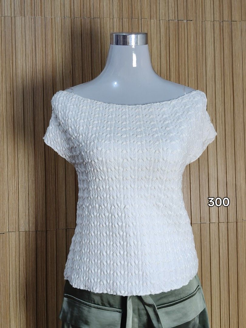 Zara White Textured Off-Shoulder Top (Category: Blouses) located in Taguig. Submitted by ashie_clothing (Listing ID 1469205100, Image 1). Description: - Brand: Zara - Style: Off-shoulder top with short sleeves - Color: White - Size: L (Tag attached) - Material: Textured fabric - Origin: Made in Turkey - Condition: Brand new with original store tag.