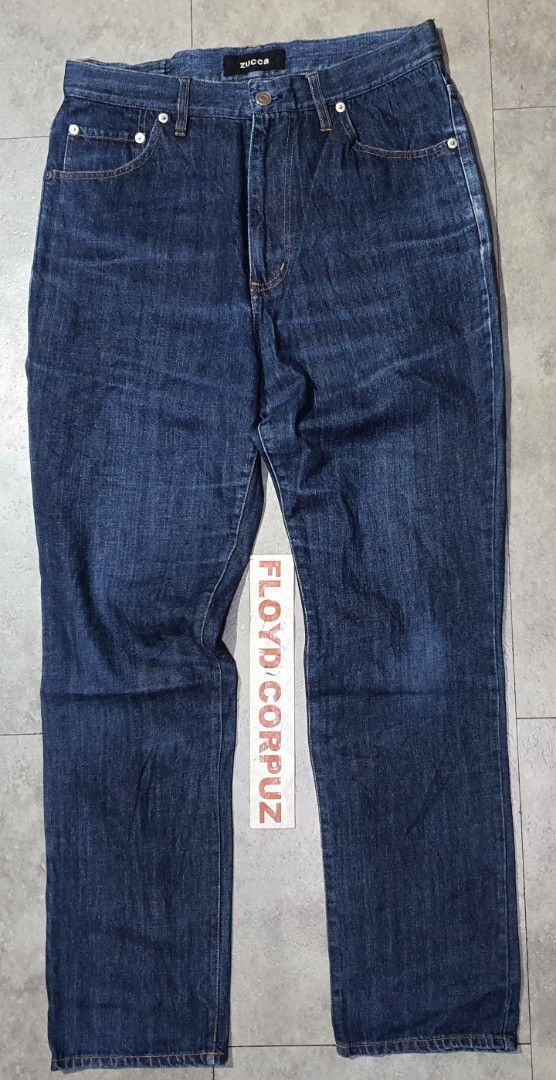 Zucca Dark Blue Denim Jeans Size M (Category: Jeans) located in Laoag. Submitted by floydg_corpuz22 (Listing ID 1469257494, Image 1). Description: Zucca dark blue denim jeans in Size M (15.5" across waist). Features a classic 5-pocket design, button fly with YKK zipper, and branded hardware. Zucca z25 30 x 39 Leg opening :6.5 Vgood 350+sf.