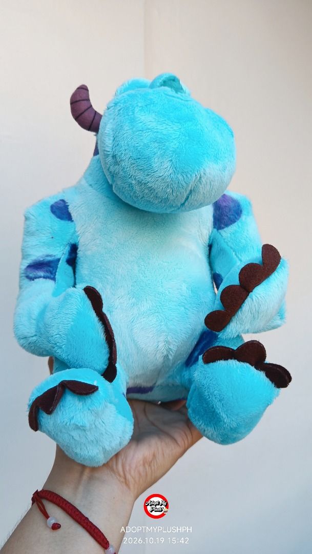 10" James P. "Sulley" Sullivan plush (Category: Plushies & Soft Toys) located in Taguig. Submitted by adopt.my.plush.ph (Listing ID 1469432881, Image 3). Description: An official 10-inch Disney-licensed James P. "Sulley" Sullivan plush toy from Monsters, Inc. / Monsters University, featuring his signature turquoise fur, purple spots, and curved horns. Whitehouse Leisure Intl UK Last 2 stocks available.