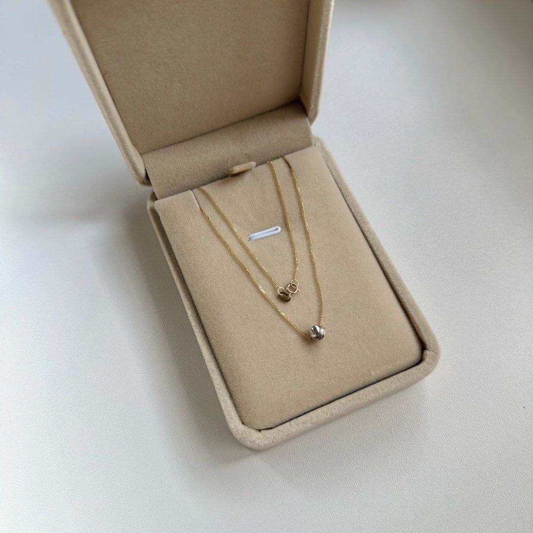 18K Two Tone 14-18” Cat Eye Necklace (Category: Necklaces) located in Mandaluyong City. Submitted by lestieco (Listing ID 1469548348, Image 2). Description: • 18k two tone (yellow gold chain, white gold pendant) • Pawnable • HK setting • 14” / 16” / 18” • Cat eye necklace • Pendant is movable • 18-inch adjustable chain with jump rings at 14” and 16” allows you to hook the clasp into three lengths (14”, 16”, or the end ring at 18”) 0.70g.