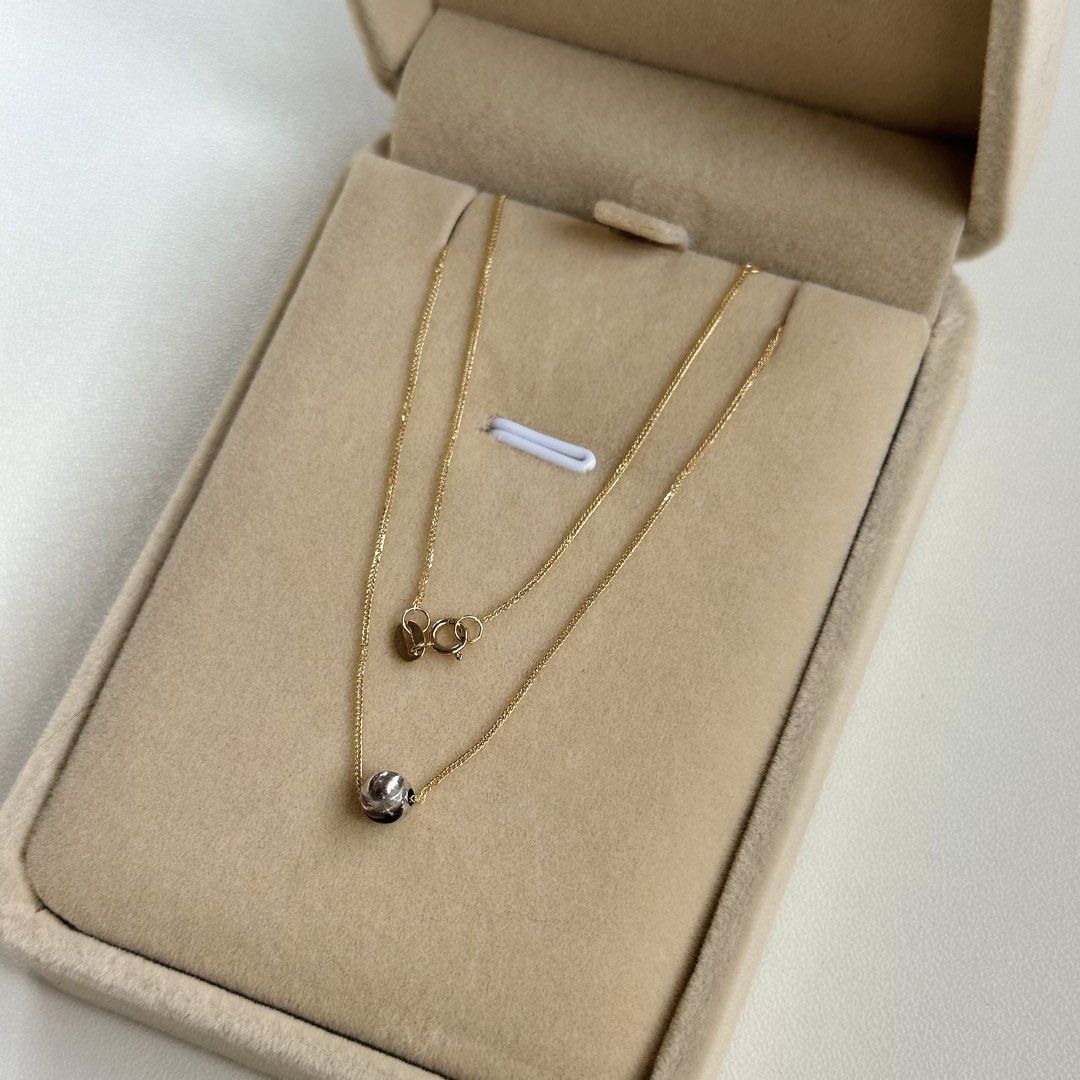 18K Two Tone 14-18” Cat Eye Necklace (Category: Necklaces) located in Mandaluyong City. Submitted by lestieco (Listing ID 1469548348, Image 3). Description: • 18k two tone (yellow gold chain, white gold pendant) • Pawnable • HK setting • 14” / 16” / 18” • Cat eye necklace • Pendant is movable • 18-inch adjustable chain with jump rings at 14” and 16” allows you to hook the clasp into three lengths (14”, 16”, or the end ring at 18”) 0.70g.