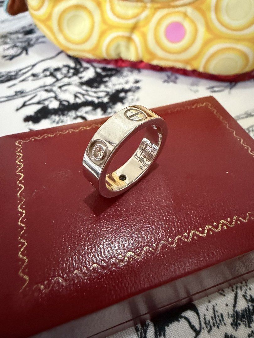 18k WG Love Ring with 3 Diamond Studs (Category: Rings) located in Cebu City. Submitted by jewelryla_finds (Listing ID 1469546304, Image 1). Description: ⭐️WG love ring with 3 dia studs💎 Preloved in good condition 18k HK settings Size 6 | 8.80 grams Note: with hairlines barely noticeable FYI: as per owner authentic daw po to but will tag as HK settings nalang po since no cert and inclusion 💰Cash | layaway Cop thru lbc with minimal dp 📍Cebu.