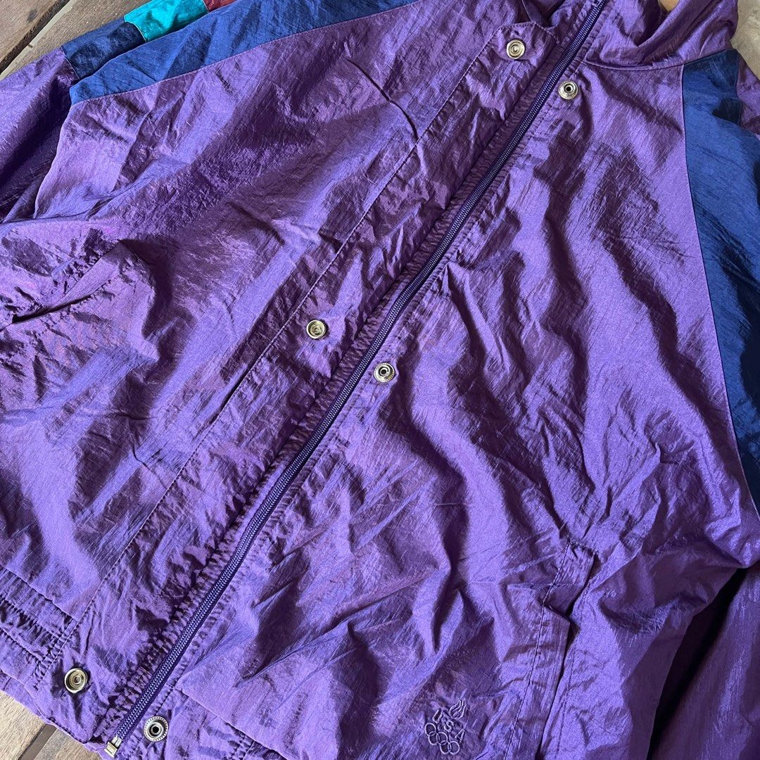 1990s Team USA Olympic Windbreaker (Category: Coats, Jackets and Outerwear) located in Santiago. Submitted by kingsthrift420 (Listing ID 1469497335, Image 2). Description: - Vintage 1990s Team USA Olympic Jacket - Good Condition - Nylon Frabric - Color : Purple - Size : Medium width 23" length 26" - ₱849 + shipping fee .