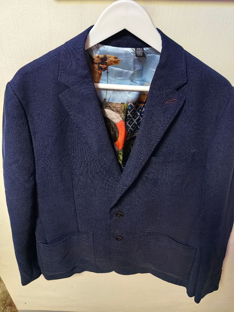2 PCS TED Baker Navy Blue Suit Jacket/Coat (Category: Coats, Jackets and Outerwear) located in Tarlac. Submitted by jeremiah.curator.2026 (Listing ID 1469404537, Image 2). Description: - Brand/Model: Ted Baker Endurance Wool Blazer - Color/Pattern: Deep blue with a subtle check pattern - Size: 5 - Closure: Double button front with custom branded buttons and contrast stitching - Lining: Unique printed inner lining featuring a desert camel scene an