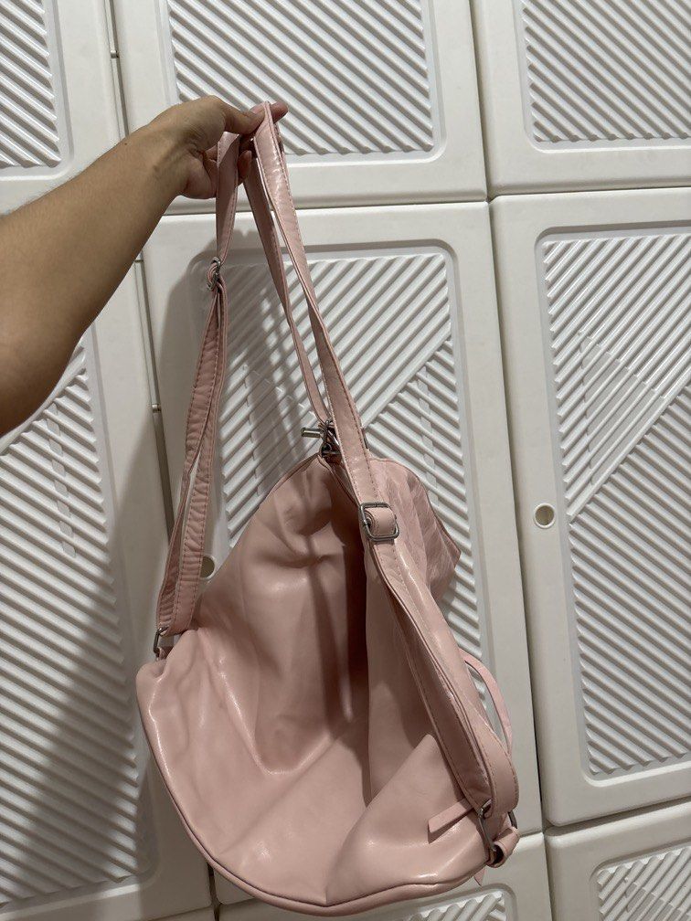2way Pink Shoulder bag/Backpack (Category: Tote Bags) located in Mandaluyong City. Submitted by itspink_lacey (Listing ID 1469395477, Image 3). Description: Almost new 2 way bag Can be shoulder bag or backpack Can fit 13 inch laptop Still in very very good condition Looks new.