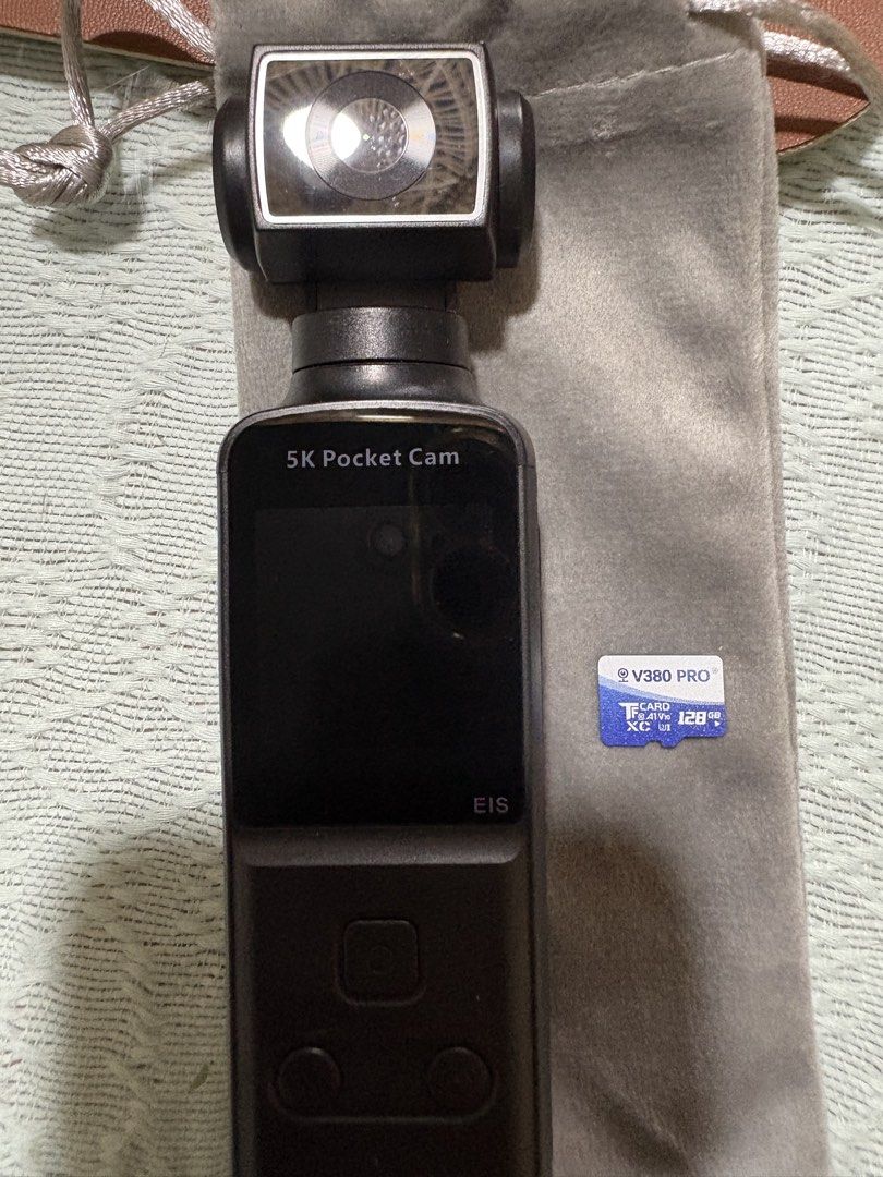 5K Pocket Cam EIS Gimbal Camera with Accessories (Category: Cameras) located in Muntinlupa City. Submitted by koi_143 (Listing ID 1469475167, Image 3). Description: - 5K Pocket Camera with Electronic Image Stabilization - Condition: Powers on, gimbal mechanism moves freely - Ideal for vlogging and travel videos - Includes 128GB microSD card - Comes with original box, storage pouch, lapel microphone, mounting bracket, and straps - All pictured ite