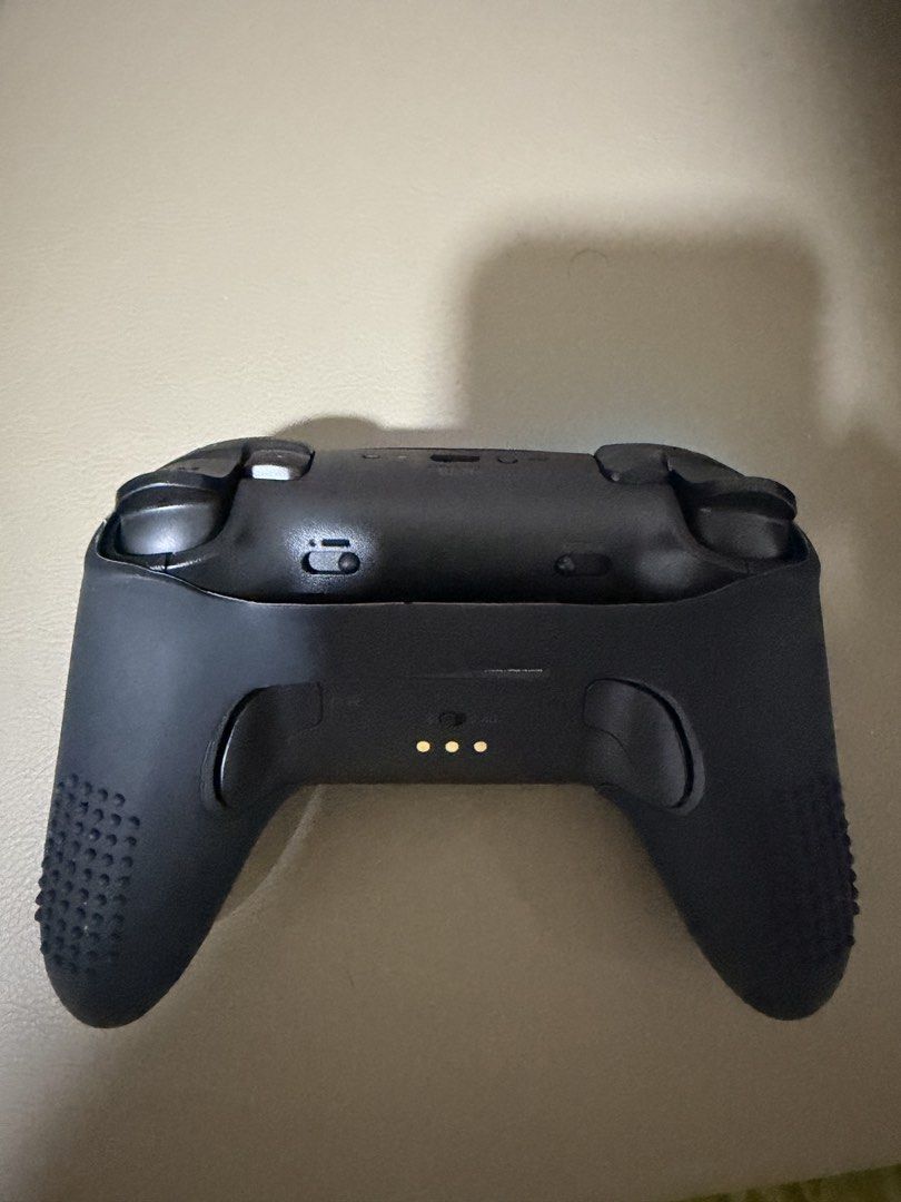8bitdo controller (Category: Controllers) located in Singapore. Submitted by javier.chng (Listing ID 1469403507, Image 2). Description: Controller only used twice for racing games but not suitable to me, both times also use at most 2 hours each Battery life is 8hours per charge at least Silicone cover also included as well as charging dock Box also still have .