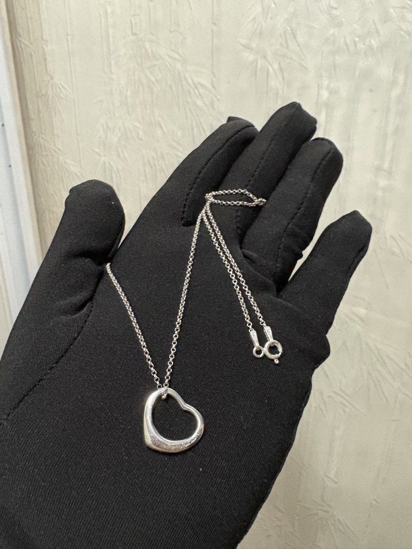 925 Sterling Silver Open Heart Necklace (Category: Necklaces) located in Quezon City. Submitted by meggys_treasures (Listing ID 1469486661, Image 1). Description: Want a long lasting jewelry but have no budget for Gold? Silver is for you! :) Silver prices are going up, invest now! - Size 18 - TF inspired (w/ brand markings, pls chat for clear front pics) - Original Sterling Silver with 925 marking - Perfect for everyday use (it even gets shinier 