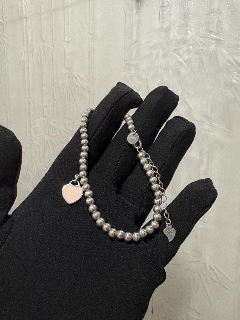 925 Sterling Silver Pink Heart Bubble Bracelet (Category: Bracelets) located in Quezon City. Submitted by meggys_treasures (Listing ID 1469488009, Image 2). Description: Want a long lasting jewelry but have no budget for Gold? Silver is for you! :) Silver prices are going up, invest now! - Size 7.5-9in - TF inspired (w/ brand markings, pls chat for front pics) - Original Solid Sterling Silver with 925 marking - Perfect for everyday use (it even g