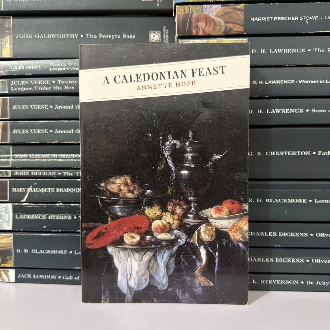 A Caledonian Feast by Annette Hope (Category: Storybooks) located in Lingayen. Submitted by readwjane (Listing ID 1469467294, Image 1). Description: - Title: A Caledonian Feast by Annette Hope - Genre: Traditional Scottish food and cooking history - Cover: Classic still life painting design - Condition: Clean cover edges, slight shelf wear on the spine, pages are fully intact - Ideal for: Food history enthusiasts and fans of Scottish culture.