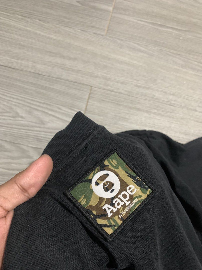 AAPE by A Bathing Ape Moonface Logo-Patch Black T-Shirt (Category: Tshirts & Polo Shirts ) located in Pozorrubio. Submitted by plco. (Listing ID 1469525842, Image 3). Description: AAPE by A Bathing Ape Moonface Logo-Patch Black T-Shirt S on tag 21x28 color rate: 10/10 complete tags repaired pinhole no other issues.