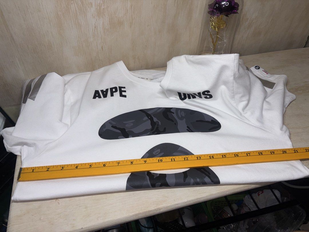 AAPE SHIRT (Category: Tshirts & Polo Shirts ) located in Cabuyao City. Submitted by pormanation-thrift-store (Listing ID 1469468489, Image 2). Description: AAPE SHIRT Condition: LIKE NEW Color rate: 10/10 (PWEDE SA MASELAN) Size: LARGE Dimes: 21”Wx29”L Issue: NONE✅ Price: 1200.