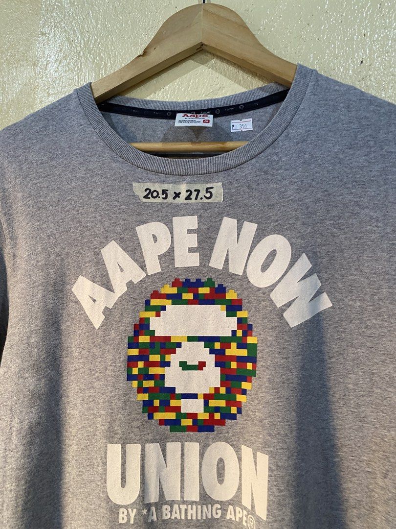 Aape shirt (Category: Tshirts & Polo Shirts ) located in Calapan. Submitted by mnlhabithrift23 (Listing ID 1469514035, Image 2). Description: Width : 21 Length : 28 Color rate : 9/10 Issue : hairlines color may change due to lighting .