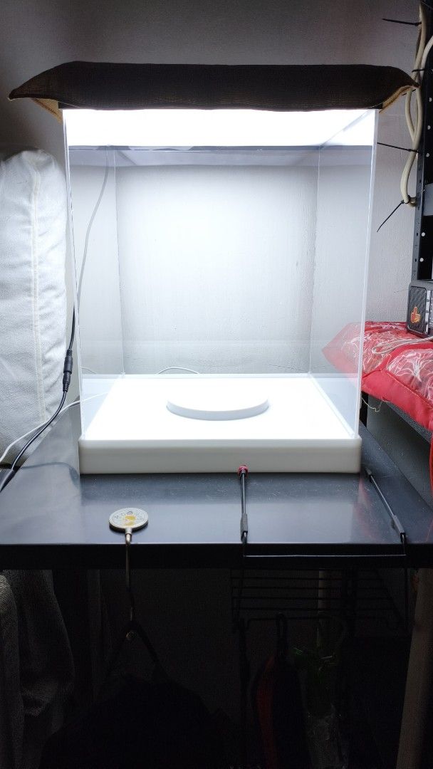 Acrylic Display Case with Light and Turntable (Category: Storage Boxes & Baskets) located in Manila. Submitted by wandering.witch (Listing ID 1469511194, Image 1). Description: Last Price already Customized Acrylic Display Case Location: Sta. Ana, Manila Acrylic Box 41cm (H) x 31cm (W) x 31cm (D) Turntable: 14cm circumference Features: - Ceiling completely lights up via switch - Turntable spins once plugged - Lift the box to open it RFS: Downsizi