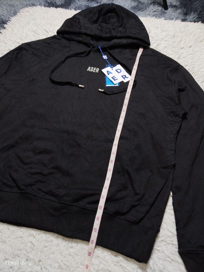 ADER error fullover with tape print on front and lining stitching tape on back. (Category: Hoodies) located in Manila. Submitted by lexusthrift1995 (Listing ID 1469502432, Image 3). Description: Size- LARGE to XL Dimension- 24x28 Color rate- 10/10 Condition- 10/10 issue- no issue brand condition good condition ‼️650.pesos plus shipping fee 💸MODE OF PAYMENT- GCASH payment first 🚛MODE OF DELIVERY- J&T or LALAMOVE 📍LOCATION- NORTH CALOOCAN CAMARI