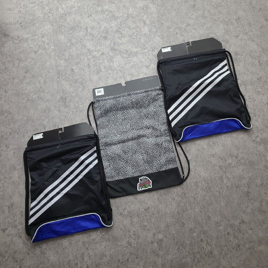 Adidas and Jordan Drawstring Bags Set (Category: Backpacks) located in Quezon City. Submitted by mofinds.ph (Listing ID 1469496450, Image 2). Description: Selling as BUNDLE PACK ONLY (3 PCS) — NOT SELLING SEPARATELY / NO SPLIT ​ALL BRAND NEW WITH TAGS (BNWT) 100% Authentic / Original MOP: BPI DELIVER: LALAMOVE OR J&T MEETUP/PICKUP: Victoria Tower D, Mother Ignacia Ave., Brgy. Paligsahan, Diliman, Quezon City.
