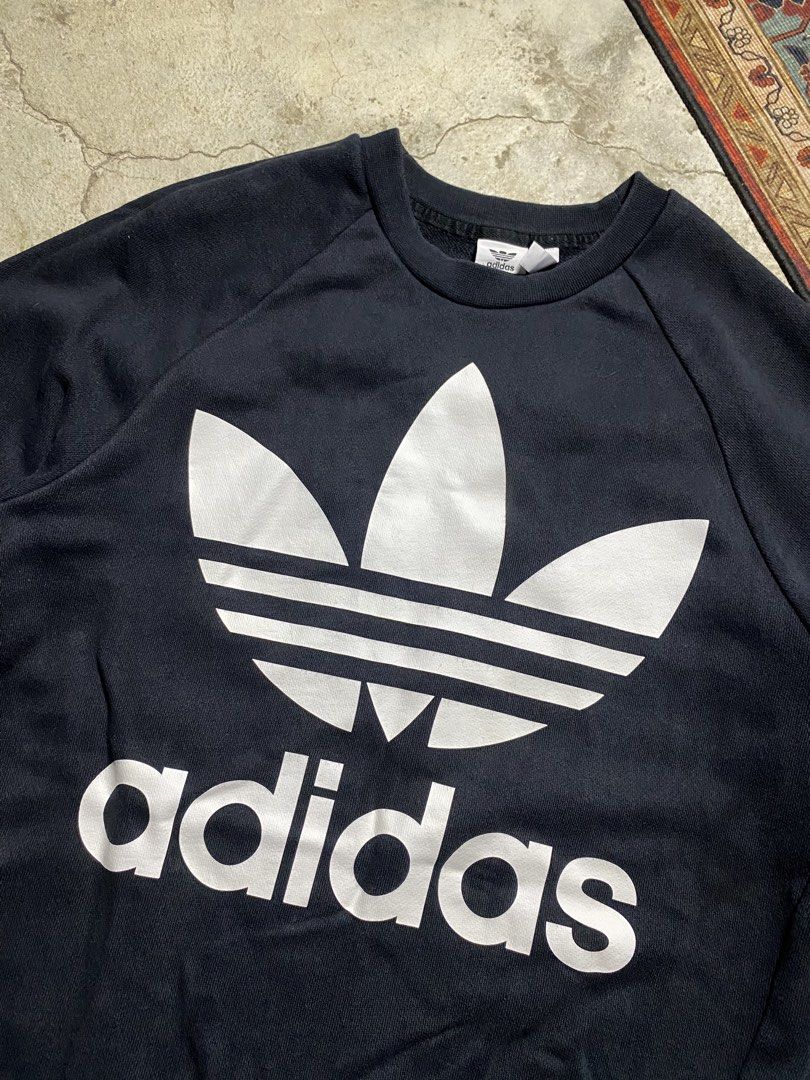 Adidas big logo Crewneck (Category: Longsleeves) located in Trece Martires City. Submitted by ridgeridethrift (Listing ID 1469529965, Image 2). Description: Width - 21 Length - 29.5 Sleeve - 23 Color rate : 8.5 /10 .