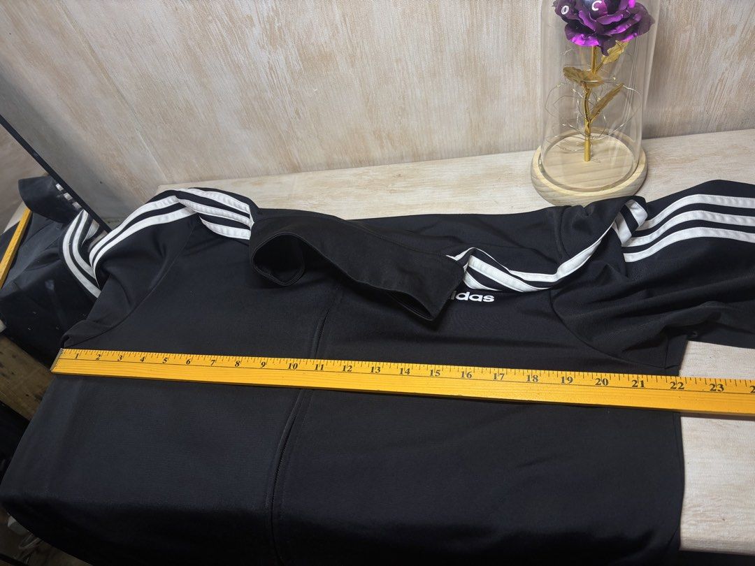 ADIDAS ESSENTIALS 3 STRIPES JACKET (Category: Coats, Jackets and Outerwear) located in Cabuyao City. Submitted by pormanation-thrift-store (Listing ID 1469560798, Image 2). Description: ADIDAS ESSENTIALS 3 STRIPES JACKET Condition: LIKE NEW Color rate: 10/10 (PWEDE SA MASELAN) Size: XXL (ASIAN) / LARGE US Dimes: 22”Wx29.5”L Issue: NONE✅ Price: 1200.