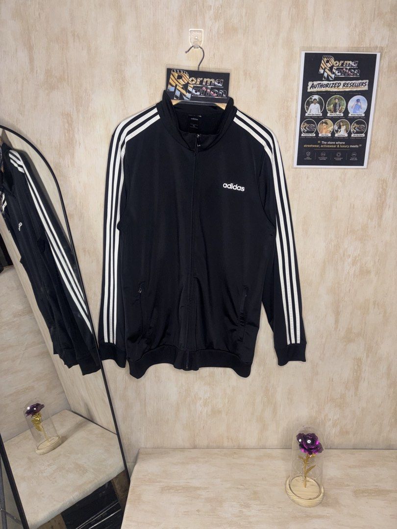 ADIDAS ESSENTIALS 3 STRIPES JACKET (Category: Coats, Jackets and Outerwear) located in Cabuyao City. Submitted by pormanation-thrift-store (Listing ID 1469560798, Image 1). Description: ADIDAS ESSENTIALS 3 STRIPES JACKET Condition: LIKE NEW Color rate: 10/10 (PWEDE SA MASELAN) Size: XXL (ASIAN) / LARGE US Dimes: 22”Wx29.5”L Issue: NONE✅ Price: 1200.