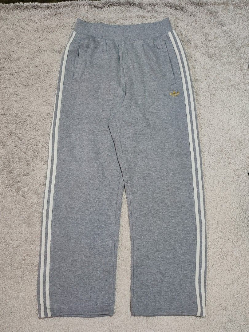Adidas Grey Sweatpants with White Stripes Size M (Category: Other Bottoms) located in Manila. Submitted by anthonig (Listing ID 1469461546, Image 1). Description: Length: 39.5 inches Width: 26 inches (stretchable) Hem: 9 inches Price: 900 pesos Condition: 9.8/10 Issues: none PM if interested or for inquiries Meetups within MANILA only Can do shipping at buyers expense.