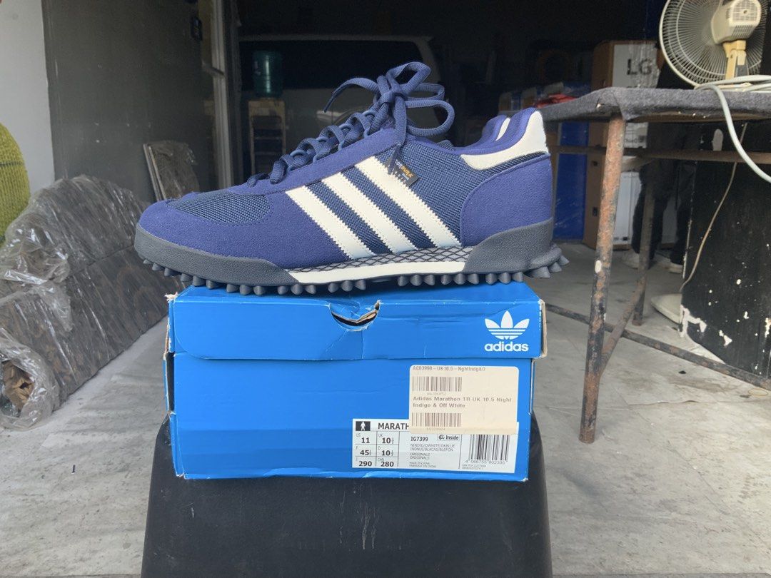 Adidas Marathon Size UK 10.5 (Category: Sneakers) located in Makati City. Submitted by imagineinc. (Listing ID 1469463556, Image 1). Description: - Model: Adidas Marathon TR - Colorway: Indigo / Off-White - Size: UK 10.5 / US 11 - Material: Durable Cordura fabric, deep blue suede, and mesh upper - Distinctive studded rubber outsole for superior grip - Classic white three stripes - Original blue shoebox included - I will not reply to Low ball bids