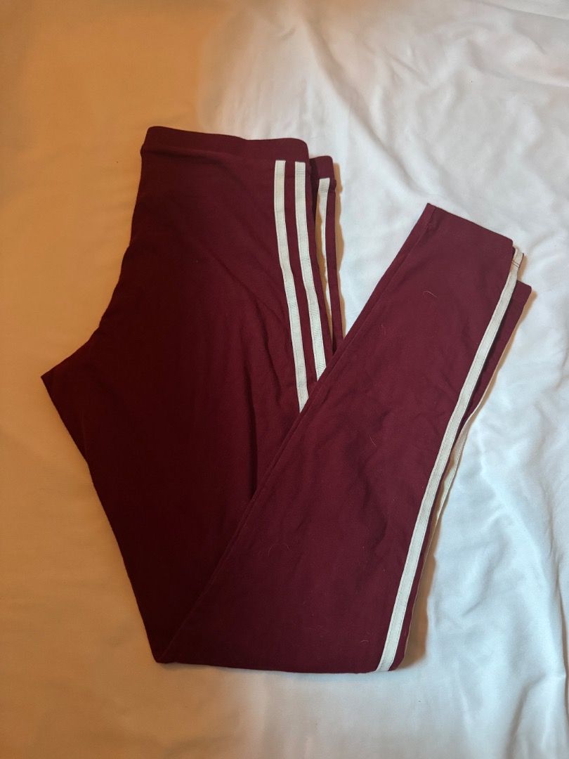 Adidas Maroon 3-Stripes Leggings Size S (Category: Activewear) located in Cebu City. Submitted by txproj27 (Listing ID 1469411321, Image 2). Description: - Brand: Adidas - Color: Maroon with white 3-stripes - Size: UK 10, US S, EU 36 - Material: Comfortable cotton blend with elastic waistband - Details: Small embroidered trefoil logo on the hip - Condition: Clean, excellent, and ready to wear - Origin: Made in Pakistan - Ideal for: Workouts or ca