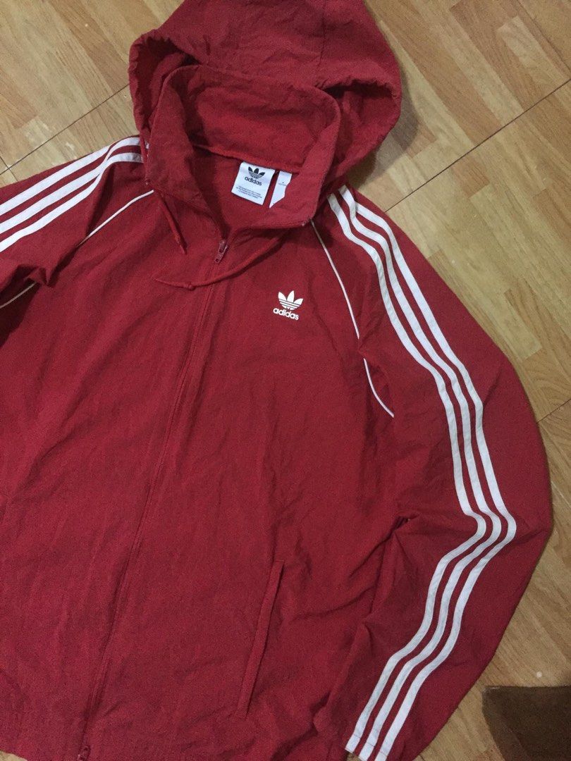 Adidas Packable Hoodie Jacket (Category: Coats, Jackets and Outerwear) located in Manila. Submitted by a.stmngo (Listing ID 1469507134, Image 2). Description: Size Medium on tag (Best fit Large to XL) Width 23.5 inches Length 30 inches Minimal dirt and stain (see last photo) Needwash Color rate 9/10 📍Manage your expectation. Item is thrifted. 📍Nagcarlan, Laguna.