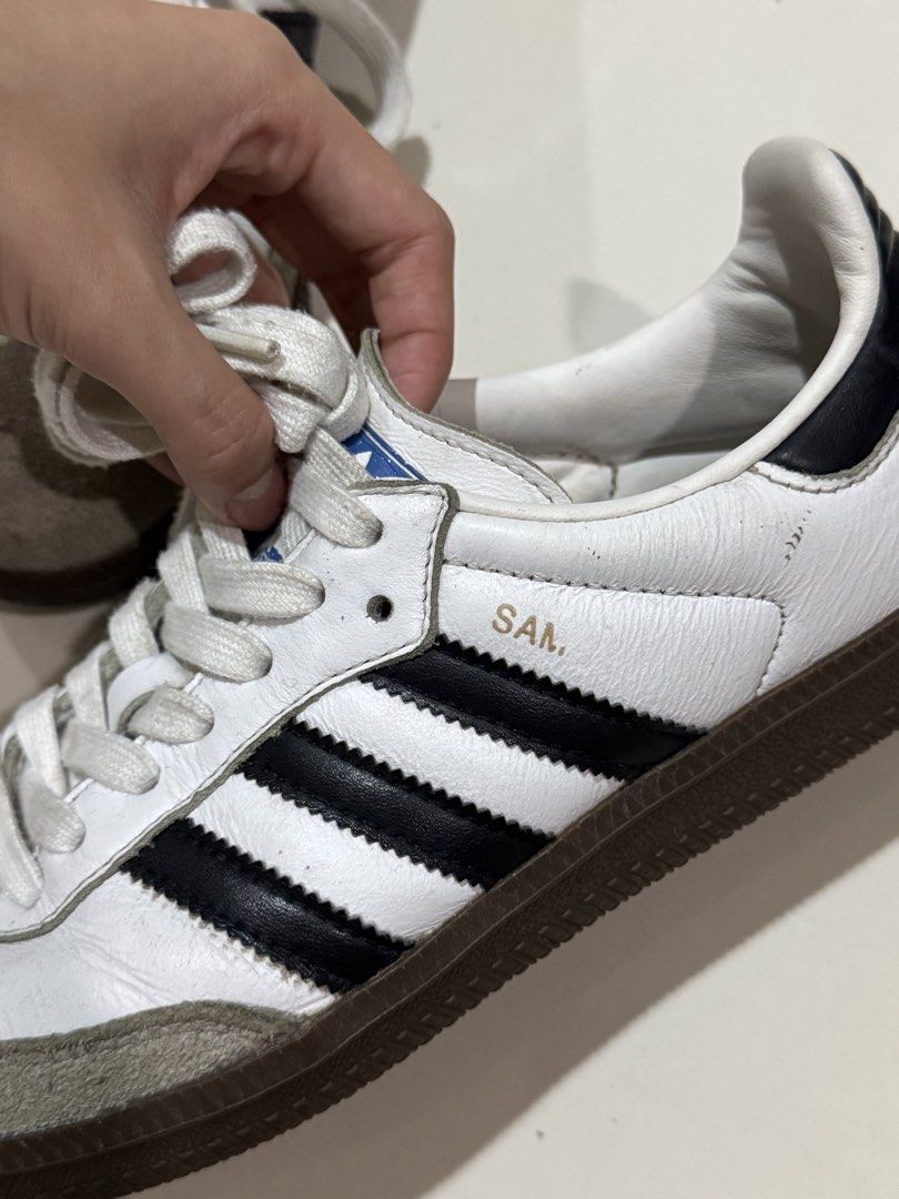 Adidas Samba OG White Black Sneakers (Category: Sneakers & Footwear) located in Manila. Submitted by buyandbyebyg (Listing ID 1469447952, Image 2). Description: • no original box • pre-loved ↳ condition is shown in the photos, so please manage expectations mop: gcash mod: lalamove / j&t 📍 taft, manila (dlsu area) please message me if interested! thank you ♡.