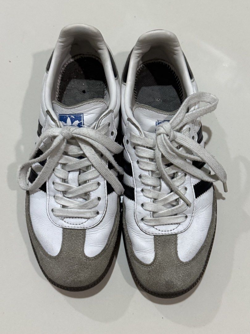 Adidas Samba OG White Black Sneakers (Category: Sneakers & Footwear) located in Manila. Submitted by buyandbyebyg (Listing ID 1469447952, Image 1). Description: • no original box • pre-loved ↳ condition is shown in the photos, so please manage expectations mop: gcash mod: lalamove / j&t 📍 taft, manila (dlsu area) please message me if interested! thank you ♡.