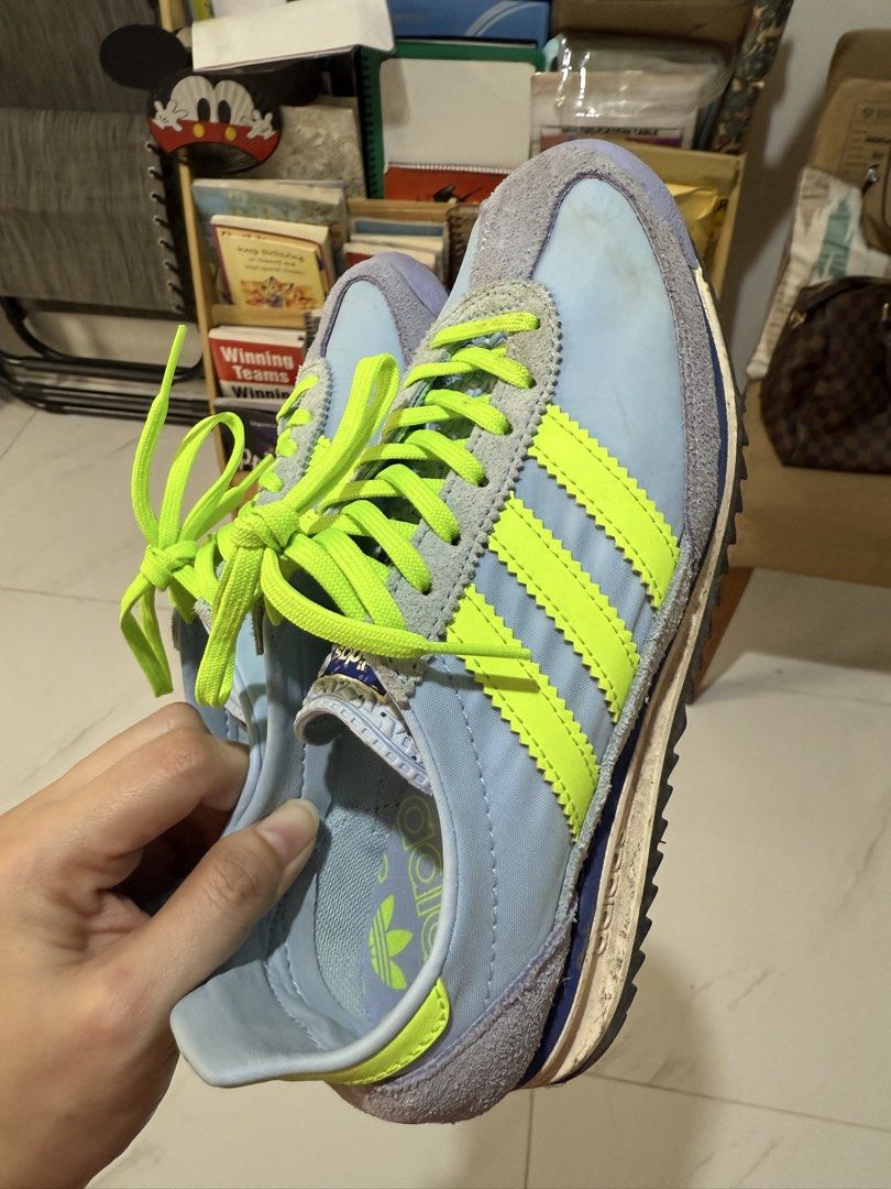 Adidas SL 72 for sale (Category: Sneakers) located in Marikina City. Submitted by minimalist27 (Listing ID 1469571566, Image 1). Description: - Brand: Adidas - Style: Classic vintage trainer - Colorway: Light blue upper with bright neon green laces and stripes - Material: Grey suede panels on toe and heel - Insoles: Original Adidas branded insoles included - Condition: White midsoles show slight dirt from previous wear.