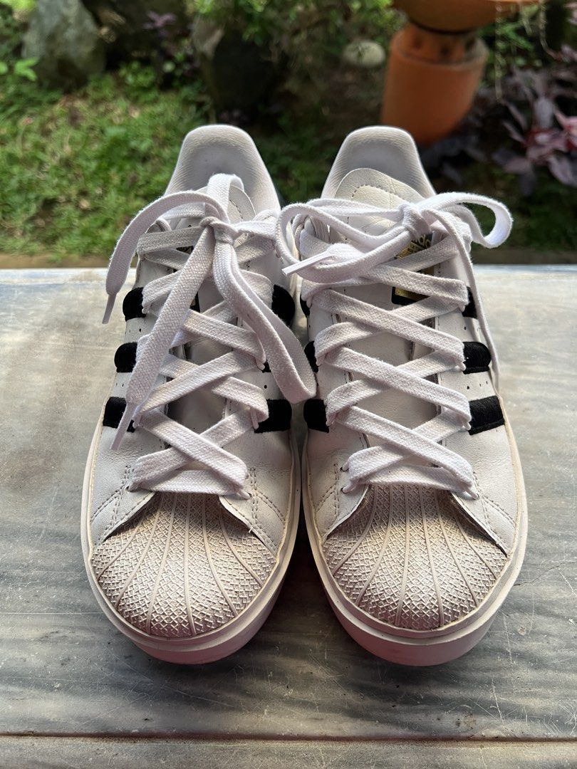 Adidas Superstar Bold White Black Platform Sneakers (Category: Sneakers) located in Tanauan. Submitted by abhieyah06 (Listing ID 1469460672, Image 1). Description: 🤍 PRELOVED ADIDAS SUPERSTAR 🤍 A timeless classic that never goes out of style. Perfect for everyday wear and easy to match with any outfit. ✔️ Original Adidas Superstar ✔️ Preloved | With signs of use ✔️ Still in good wearable condition -Twice or trice ko lang nasuot naluma na sa cab
