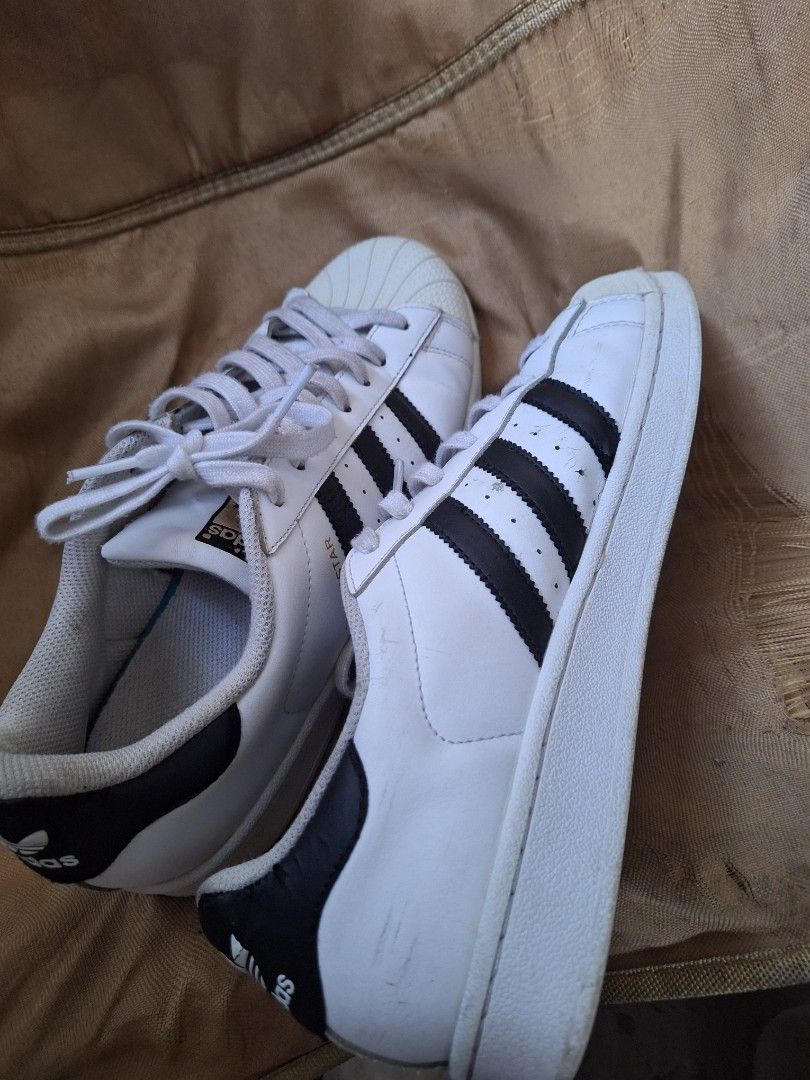 Adidas superstar size 10 (Category: Sneakers) located in Santa Rosa. Submitted by pat0317 (Listing ID 1469543891, Image 2). Description: classic gold logo adidas superstar size 10 some flaws but still presentable cod cop lbc lalamove j&t.