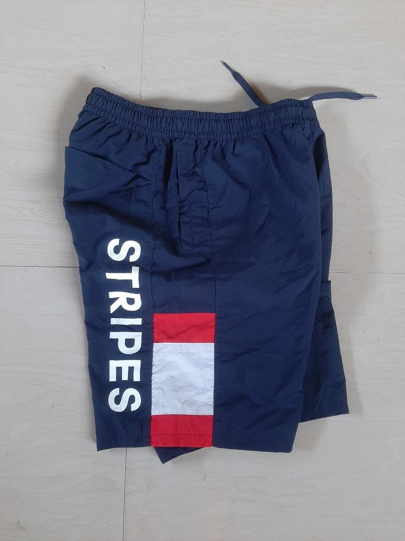 Adidas Three Stripes Woven Shorts (Category: Shorts) located in Himamaylan. Submitted by thriftsouth6108 (Listing ID 1469529592, Image 2). Description: adidas-Wording Pack Loose Fit Mesh-Lined Woven Shorts 29-32 Length: 18 As new no issue Colorate: 10/10 j&T courier can do shipping nationwide.