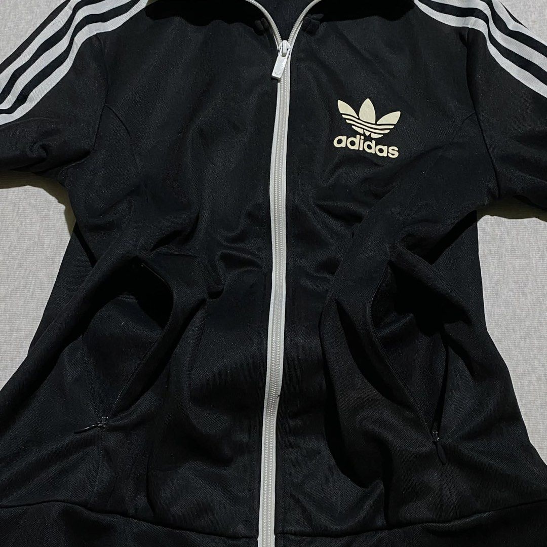 Adidas Track Jacket XS (Category: Coats, Jackets and Outerwear) located in Mabalacat. Submitted by stellargarments (Listing ID 1469427692, Image 3). Description: Length : 25 Width : 18 Condition : 9/10 GANDA NG DETAILS! SNAKE INNER MEDJ MAKAPAL LOGO WITH 3 LINES EMBROIDERED COMPLETE TAGS WITH 2 ZIPPERED POCKETS ANGAS NG INNER! SUPER NICE & KINIS! VERY COMFY & SMOOTH ON SKIN SLIGHT DISCOLORATION CHECK LAST SLIDE DUN LANG PO HINDI PANSININ 🥰 NEED 