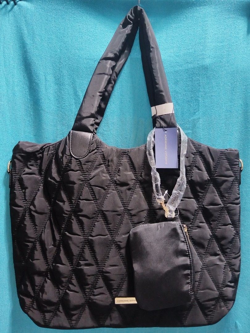 Adrienne V Puffer Bag (Category: Tote Bags) located in Las Pinas. Submitted by jpmshoppe (Listing ID 1469473658, Image 1). Description: Puffer Quilted Bag Adrienne Vitta dini Black nylon material with sling strap.