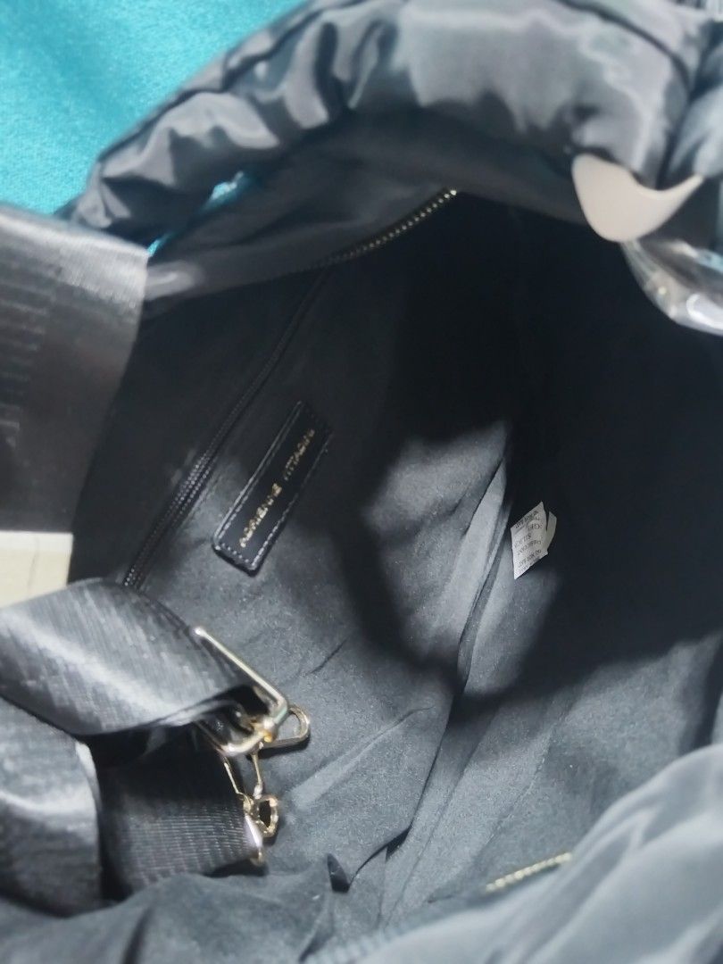 Adrienne V Puffer Bag (Category: Tote Bags) located in Las Pinas. Submitted by jpmshoppe (Listing ID 1469473658, Image 2). Description: Puffer Quilted Bag Adrienne Vitta dini Black nylon material with sling strap.