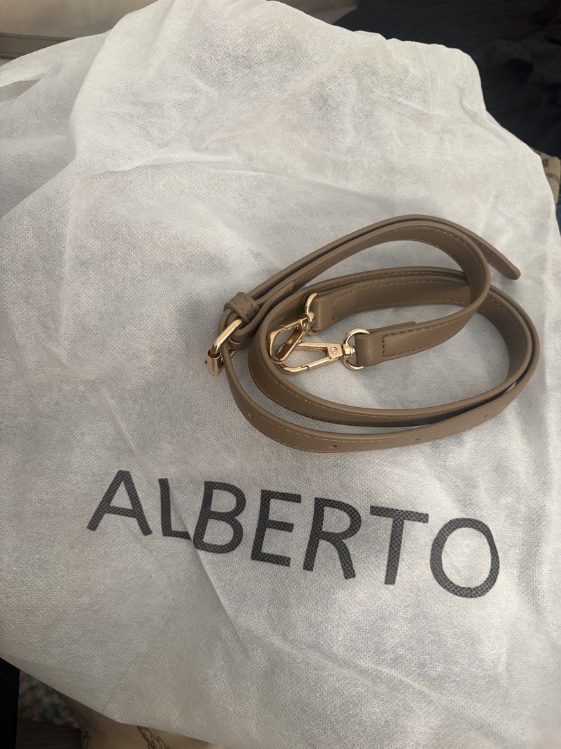 Alberto Beige Monogram Tote Bag Shoulder Bag (Category: Shoulder Bags) located in Pasay City. Submitted by chacha_15 (Listing ID 1469413386, Image 2). Description: - Authentic ALBERTO monogram print on clean beige canvas - Secure zippered top closure Few times pa lang nagamit hehe Bought for 2k plus.