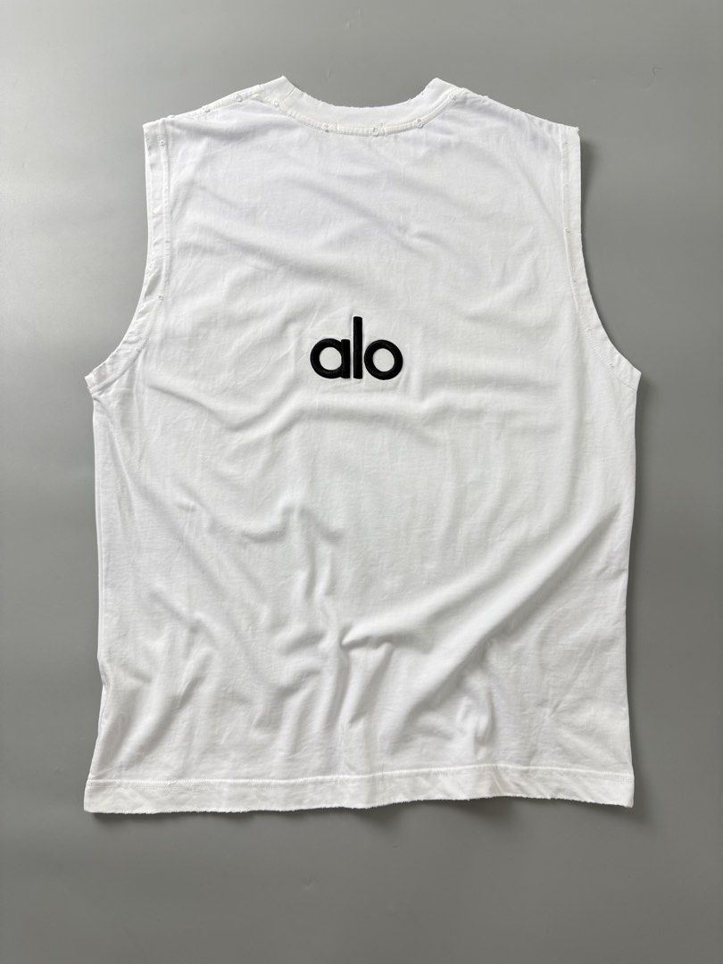 Alo tank top (Category: Tshirts & Polo Shirts ) located in Pila. Submitted by villanueva80826 (Listing ID 1469533313, Image 1). Description: Alo tank top distressed Size:large •Width:22.5 •Length:29.5 •Condition:9/10 •Color rate:9/10 Mine:880 +Shipping fee Issue:not noticeable light stain Still in good condition Still wearable .