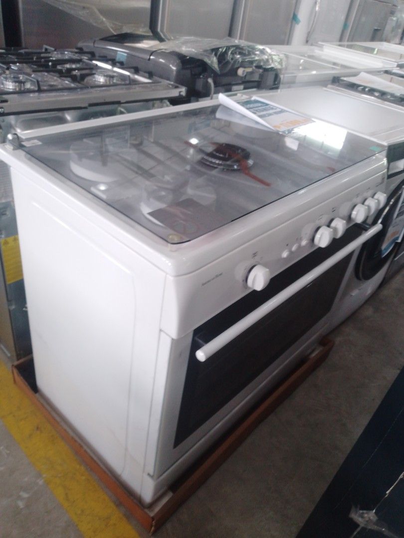 American Home Gas Range White Oven (Category: Cookers) located in Manila. Submitted by maryjane09. (Listing ID 1469455826, Image 2). Description: - Brand new white gas range stove with built-in oven compartment - 5 top burners including a central burner element for versatile cooking - Equipped with a protective glass cover and easy-to-use front control knobs - Factory-fresh unit mounted on a wooden base pallet with tag attached - Perfect upgrade 