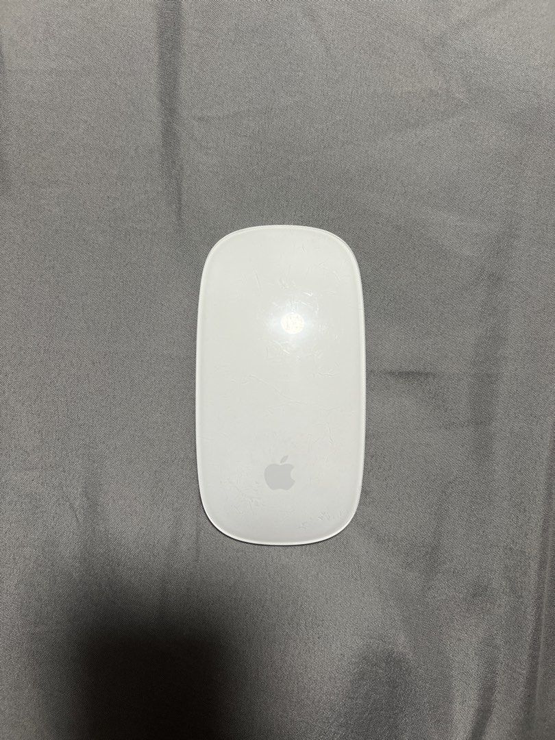 Apple Magic Mouse Version 1 (A1296) Battery Powered Wireless Mouse (Category: Mouse & Mousepads) located in Marikina City. Submitted by pepitsells (Listing ID 1469499967, Image 1). Description: classic Apple Magic Mouse Version 1 (A1296) with iconic white top and aluminum body powered by two easily replaceable AA batteries with a detachable cover all gestures work, I can send a video if needed standard Bluetooth wireless connection for seamless p