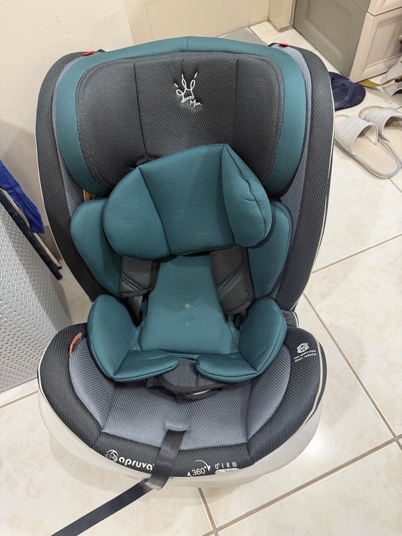 Apruva 360 Rotation Car Seat (Category: Car Seats) located in Quezon City. Submitted by juvyjuvydoo (Listing ID 1469422329, Image 1). Description: - Apruva convertible car seat with 360-degree rotation - Suitable for newborns up to 36 kg (Groups 0+, I, II, III) - Stylish dark grey and teal colorway with breathable mesh fabric - Secure 5-point harness system with padded shoulder straps - Easily adjustable headrest height Never Used stored only at 
